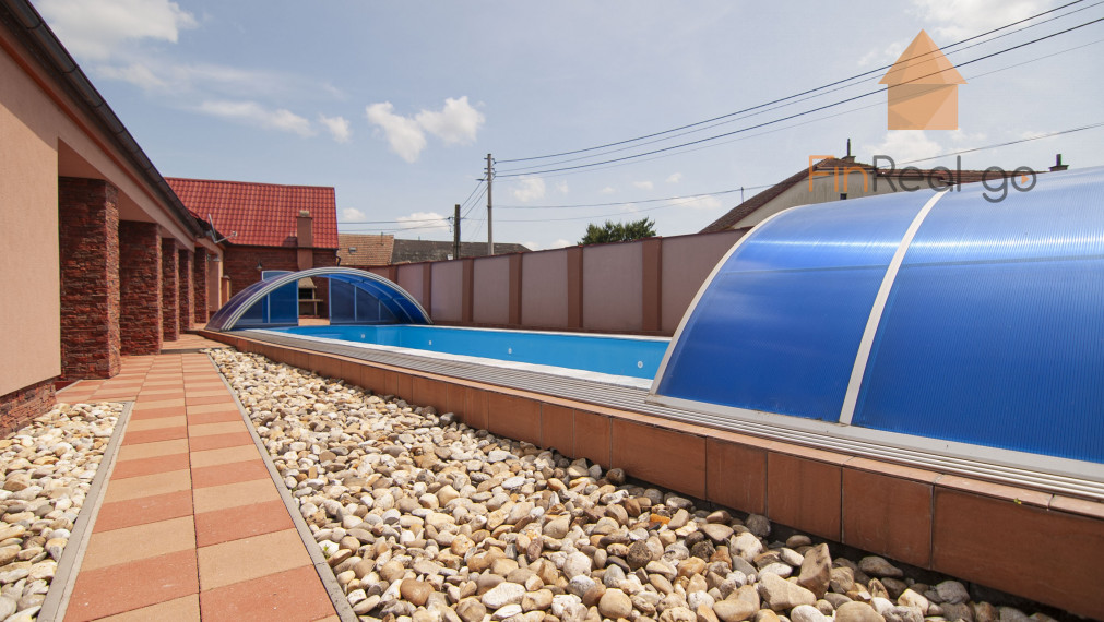 Predaj 7-izb. dom s bazénom na pozemku 561m2, Malé Leváre