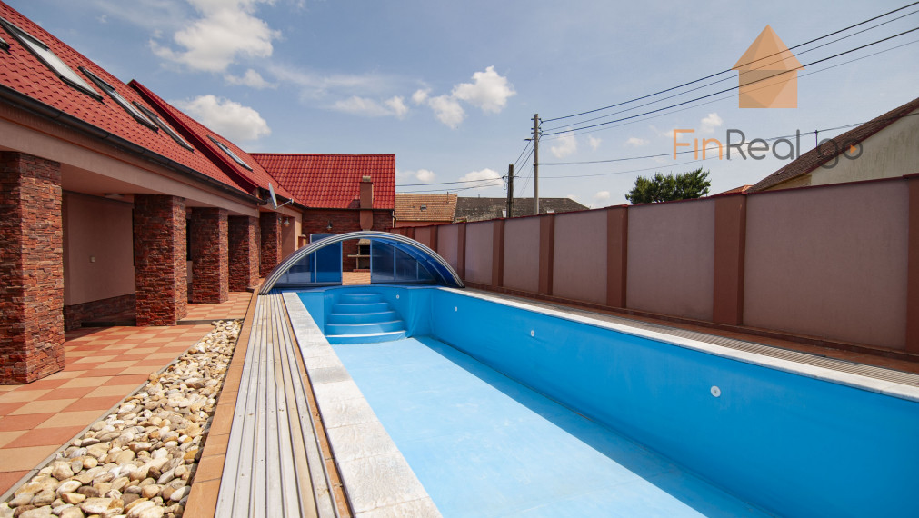 Predaj 7-izb. dom s bazénom na pozemku 561m2, Malé Leváre